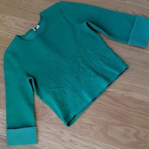 Kelly green mod embroided top from Anthropologie